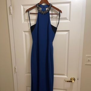 BCBG gown in blue. With neck embellishments